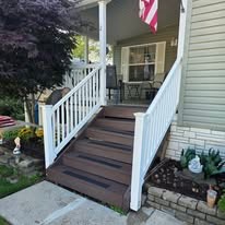 Entry steps and railing by Carter Property Restoration