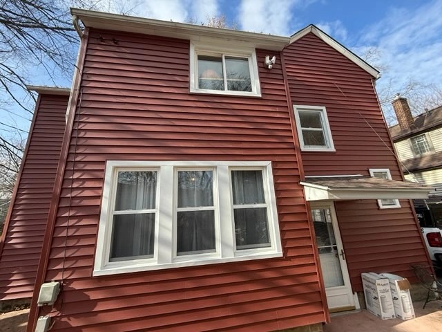 Exterior siding and window restoration